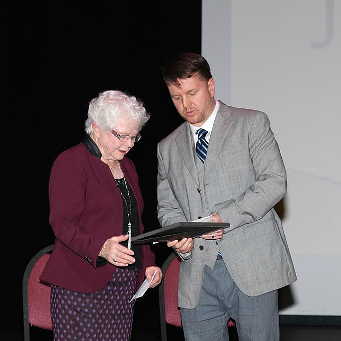 Brian Highley present award. Mother of Joanne Muirhead accepts