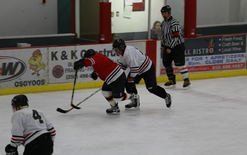 Senior men mixing it up on ice today at Oliver Arena