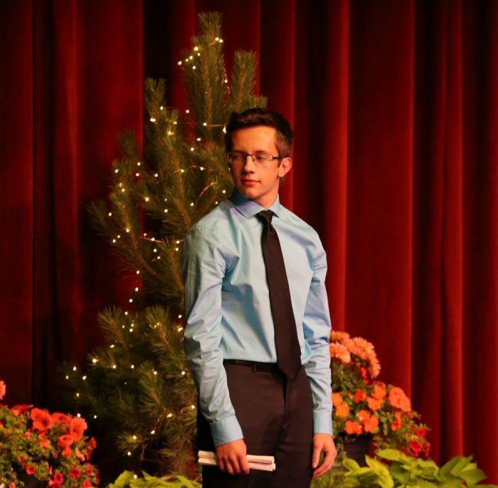 Aidan Cook after receiving an award