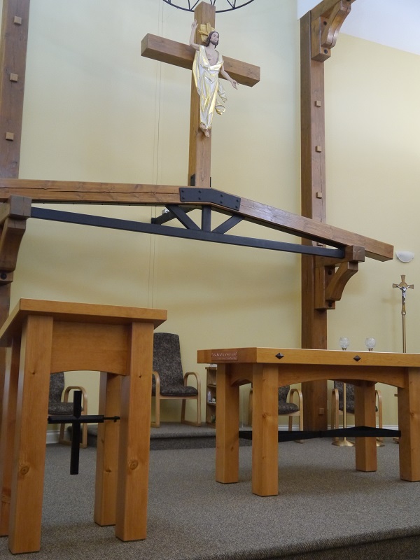 Fr Neil Lustado, Doreen Steger, Bishop John Corriveau, Frank Steger at the new, ready to go, altar.
