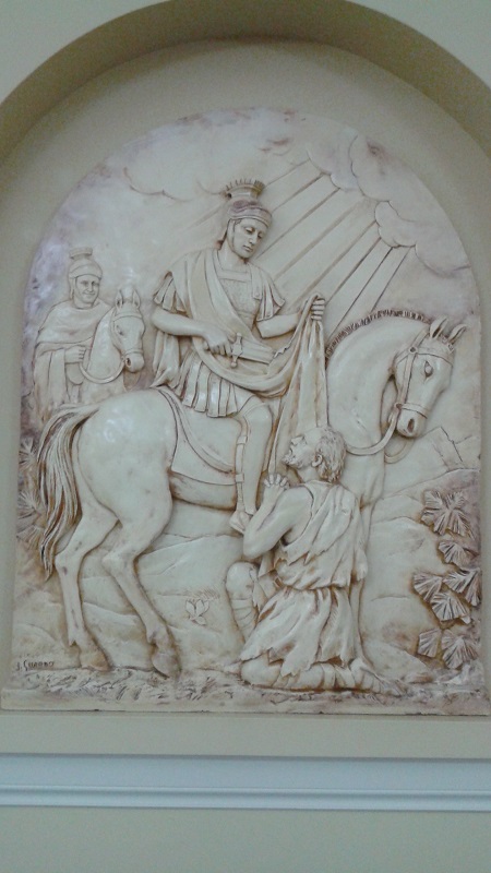 'Fresco’ of St Martin of Tours, patron saint of beggars. Here he is shown cutting his tunic to give part of it to a poor man.